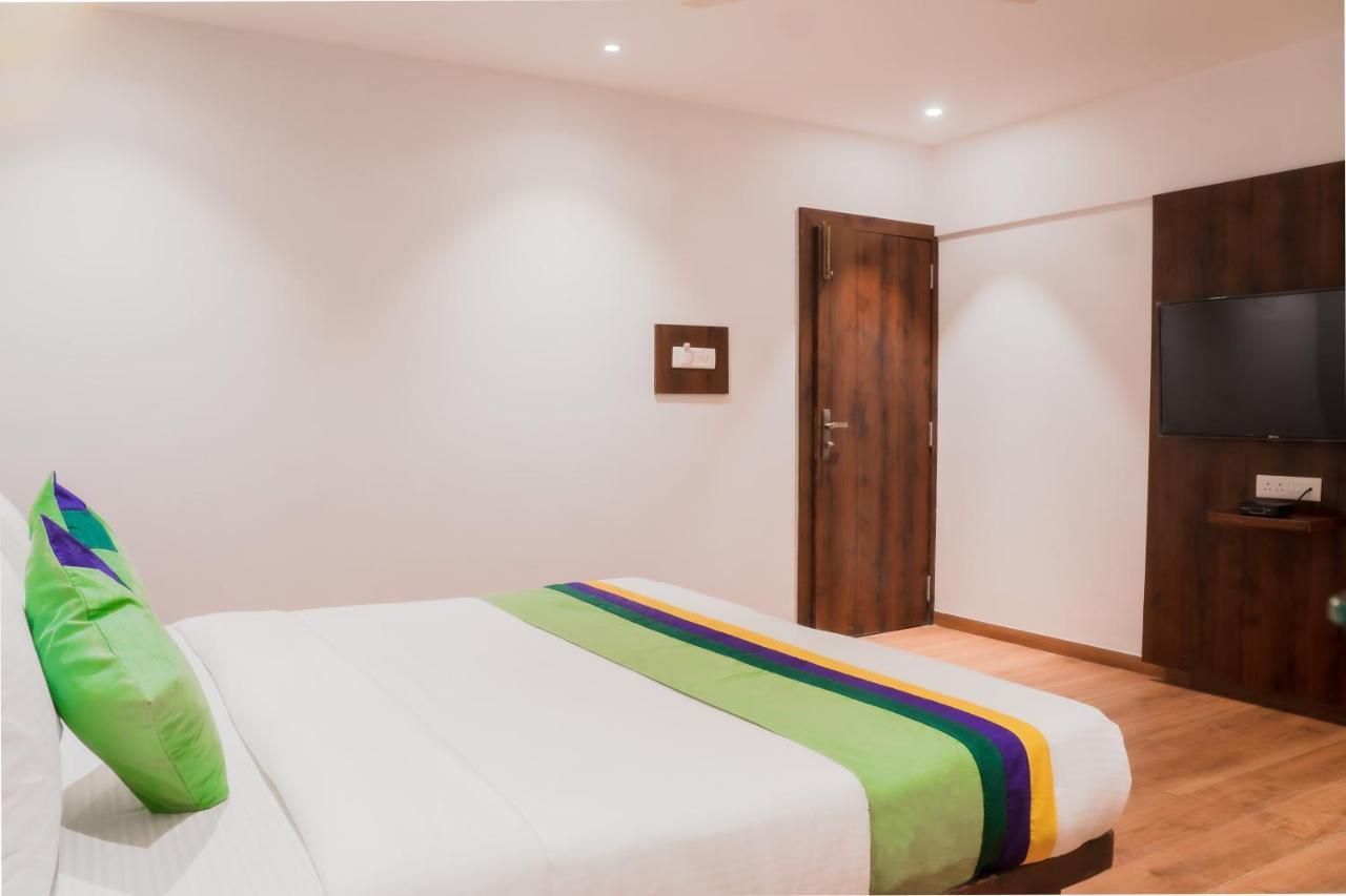 Treebo Serenity Inn, Koregaon Park Пуна Экстерьер фото